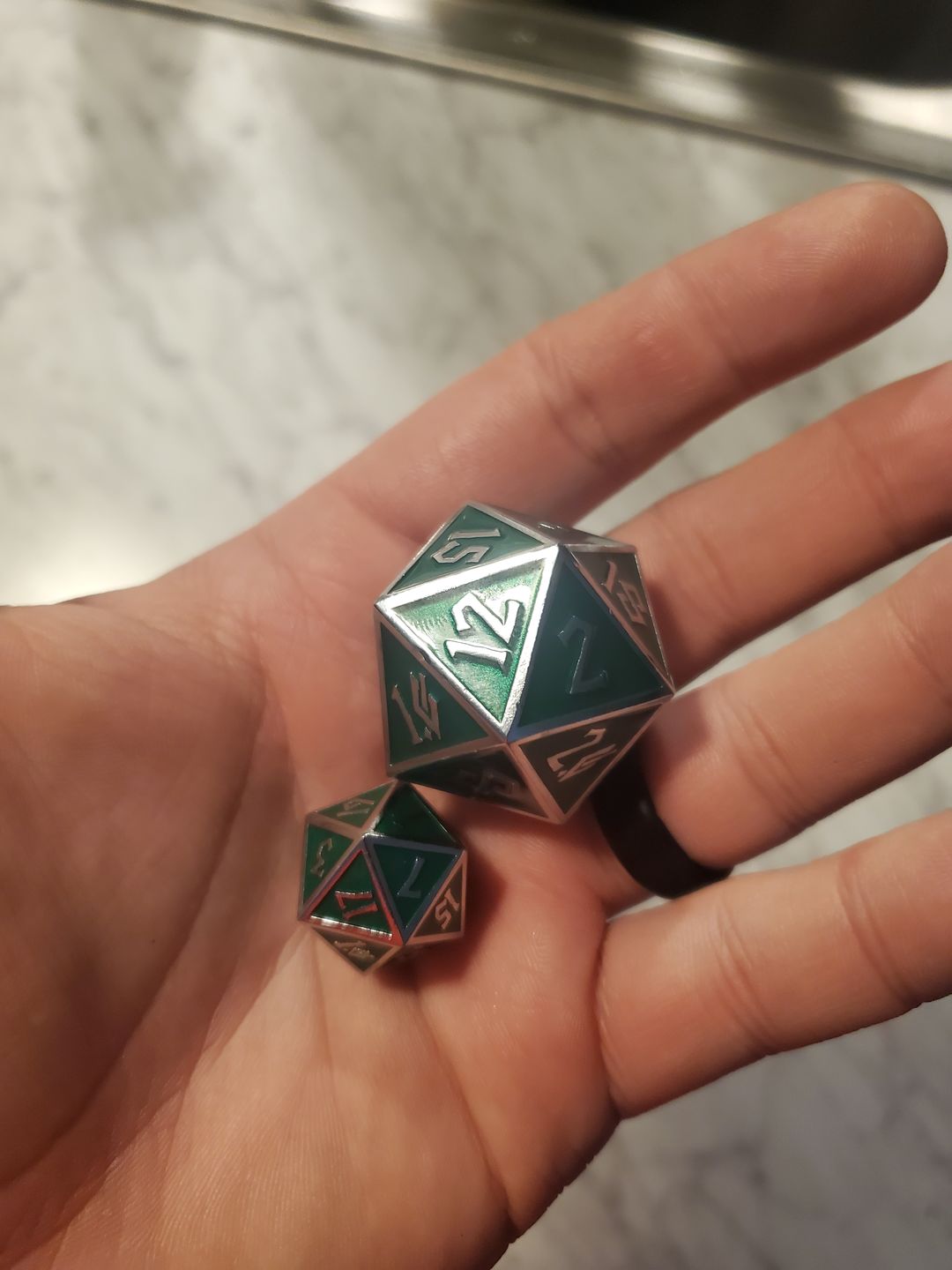 Customer photo review of ELDER RUNES EMERALD AND SILVER METAL SET