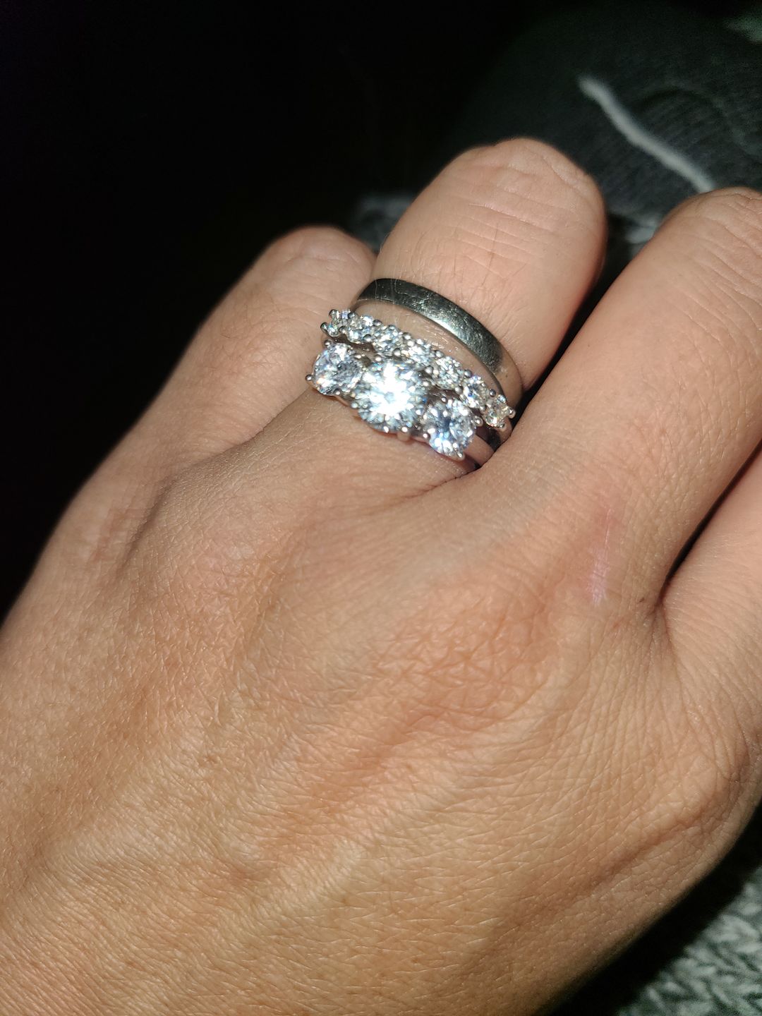 Customer photo review of Round Moissanite Sterling Silver Wedding Band Stackable Ring