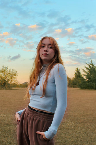 Customer photo review of SkinKiss™ Lettuce Trim Mock Neck Crop Top