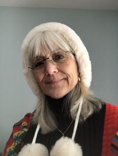 Customer photo review of Winter Women Thicken Warm Hairball Hat