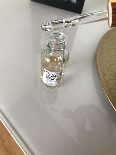 Customer photo review of 24K Gold Beauty Serum