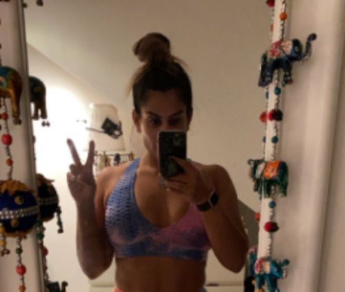 Customer photo review of GYMKARTEL® SUPPORTIVE SPORTS BRA - TIE-DYE PURPLE