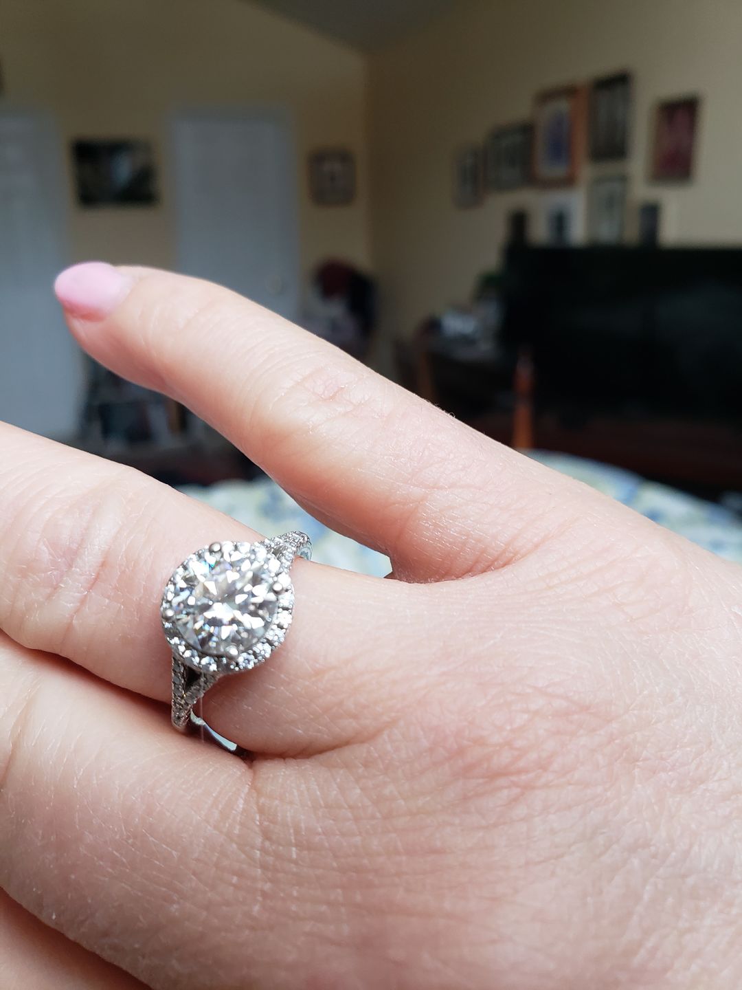 Customer photo review of Moissanite round four prong sterling silver wedding ring