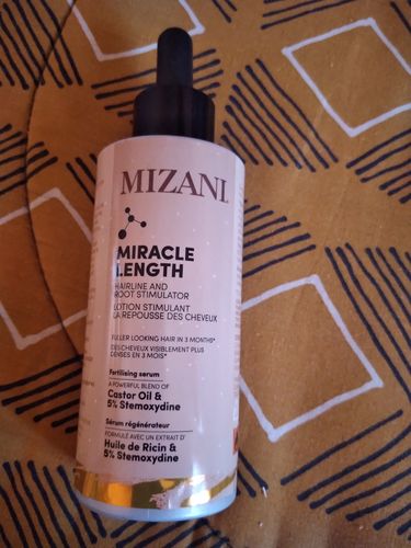 Customer photo review of Mizani Miracle Length 90ml