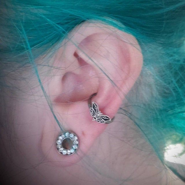 Customer photo review of 16G Death's Head Moth Captive Bead Ring