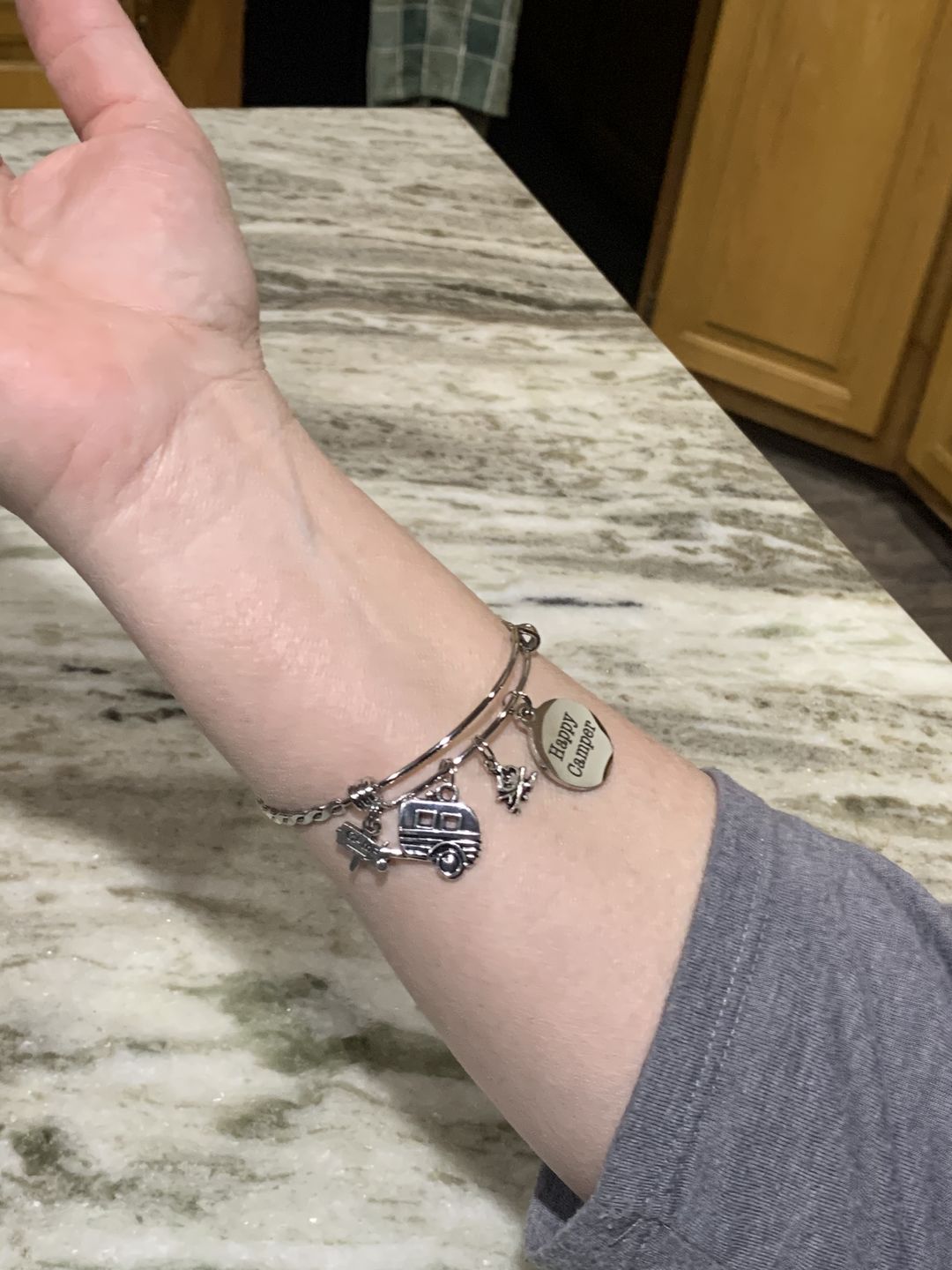 Customer photo review of 2 Braided Stainless Steel "Happy Camper" Charm Bracelets