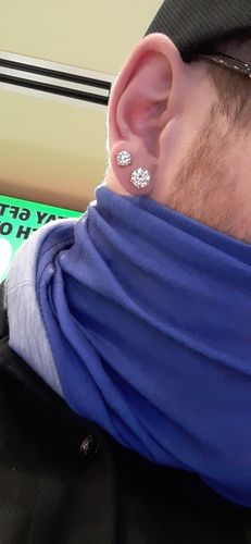 Customer photo review of VVS Moissanite Solitaire Stud Earrings