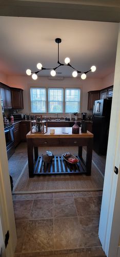 Customer photo review of Mid Century Glass Globe Branch Chandelier