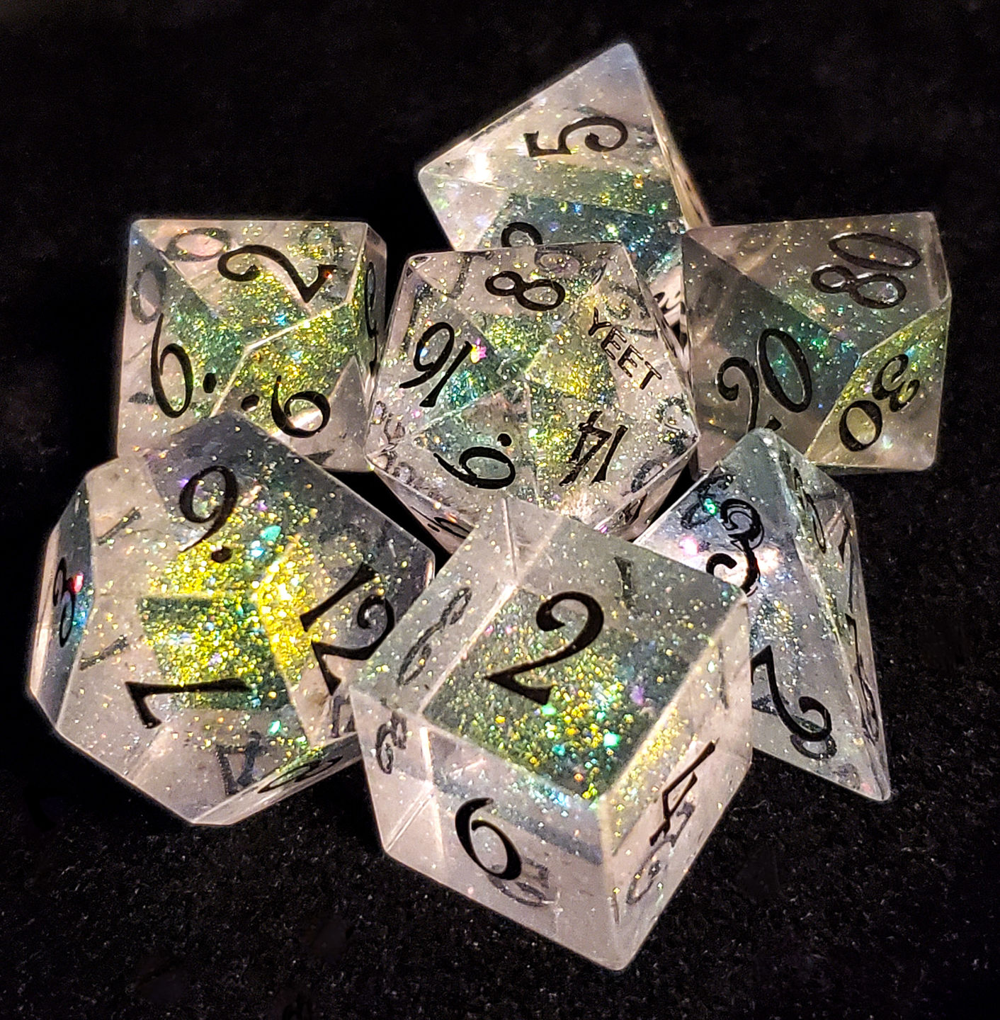 Customer photo review of URWizards Dnd Resin Aurora Glitter Engraved Dice Set YEET & F*CK