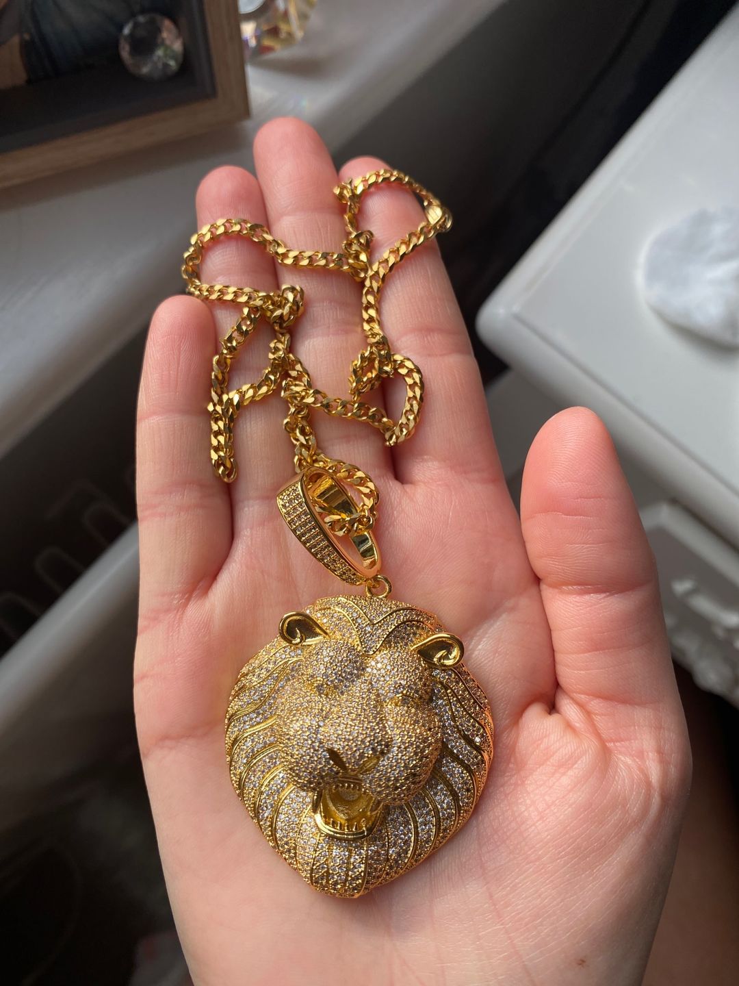 Customer photo review of Iced Out Lion Pendant