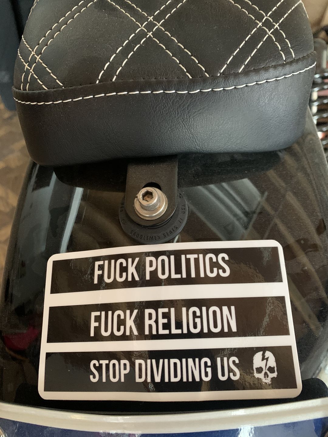 Customer photo review of STOP DIVIDING US STICKER
