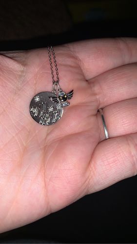 Customer photo review of Harry Potter Hedwig Owl Candle - 925 Sterling Silver Hedwig Owl Necklace Collection
