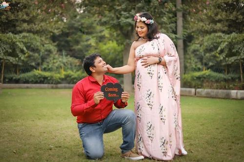 Customer photo review of Luxe Carnation Pink One Shoulder Floral Maternity Gown