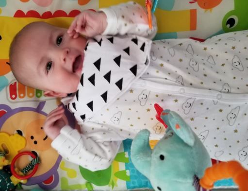 Customer photo review of Organic Baby Bandana Bibs