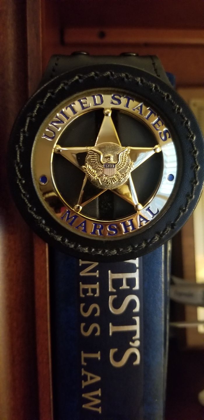 Customer photo review of US Federal Court Law Enforcement Marshal Gold Badge Replica Movie Props