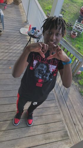 Customer photo review of Premium Side Stripe Zip Pocket Track Pants (Black - Red)