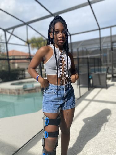 Customer photo review of Sleeveless sheer lace up crop top