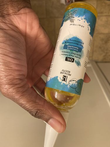 Customer photo review of Nourishing & Conditioning Hair Oil | 4 oz