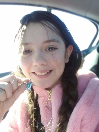 Customer photo review of Save a Turtle Necklace