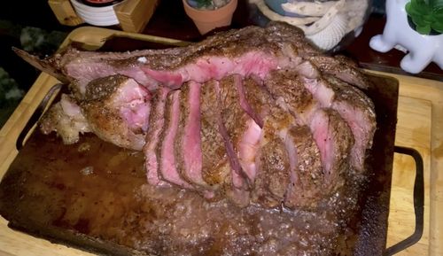 Customer photo review of Mini Bone Tomahawk Steak, Prime