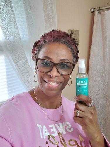 Customer photo review of Hair Growth Serum for Curly Hair with Organic Hemp Seed Oil and Watermelon Fragrance