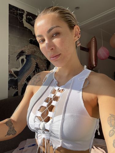 Customer photo review of Sleeveless sheer lace up crop top