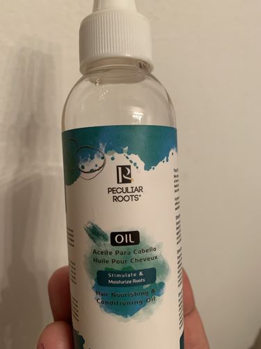 Customer photo review of Nourishing & Conditioning Hair Oil | 4 oz
