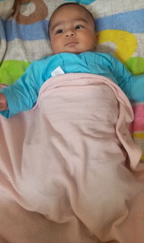 Customer photo review of Light Pink Thermal Knit-Baby Receiving Blanket