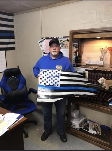 Customer photo review of Tattered Thin Blue line Flag - Yard Sale Item (as is condition)