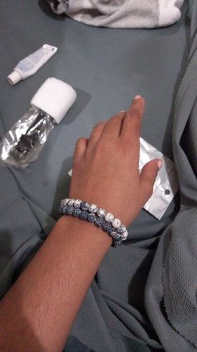 Customer photo review of His & Hers Distance Bracelets
