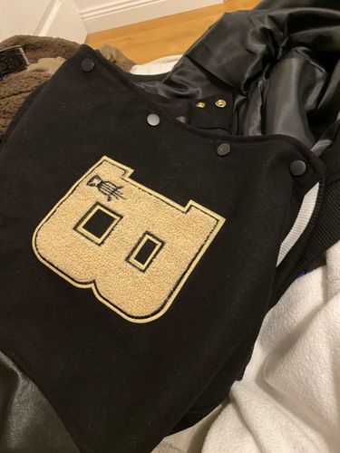 Customer photo review of "Blessed" Varsity Jacket