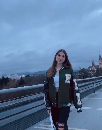 Customer photo review of "Blessed" Varsity Jacket