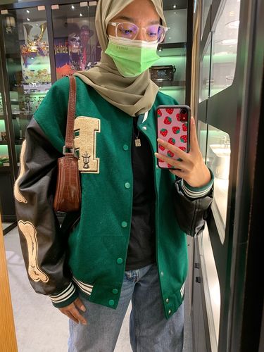 Customer photo review of "Blessed" Varsity Jacket