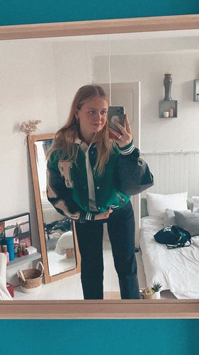 Customer photo review of "Blessed" Varsity Jacket