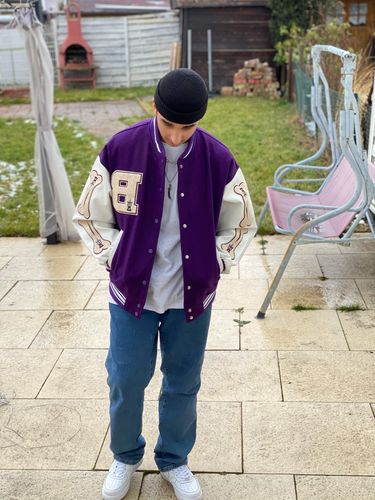Customer photo review of "Blessed" Varsity Jacket