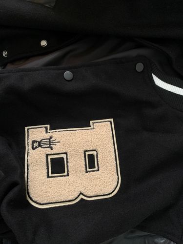 Customer photo review of "Blessed" Varsity Jacket