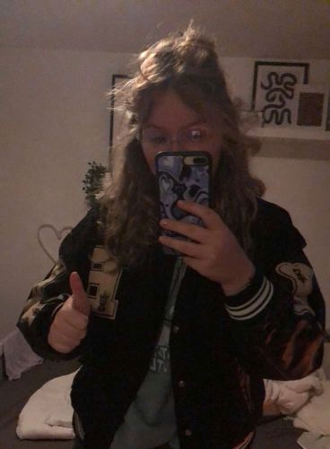 Customer photo review of "Blessed" Varsity Jacket