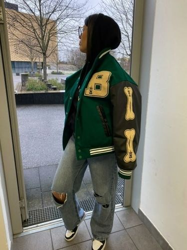 Customer photo review of "Blessed" Varsity Jacket