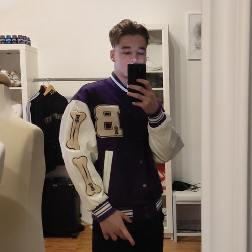 Customer photo review of "Blessed" Varsity Jacket