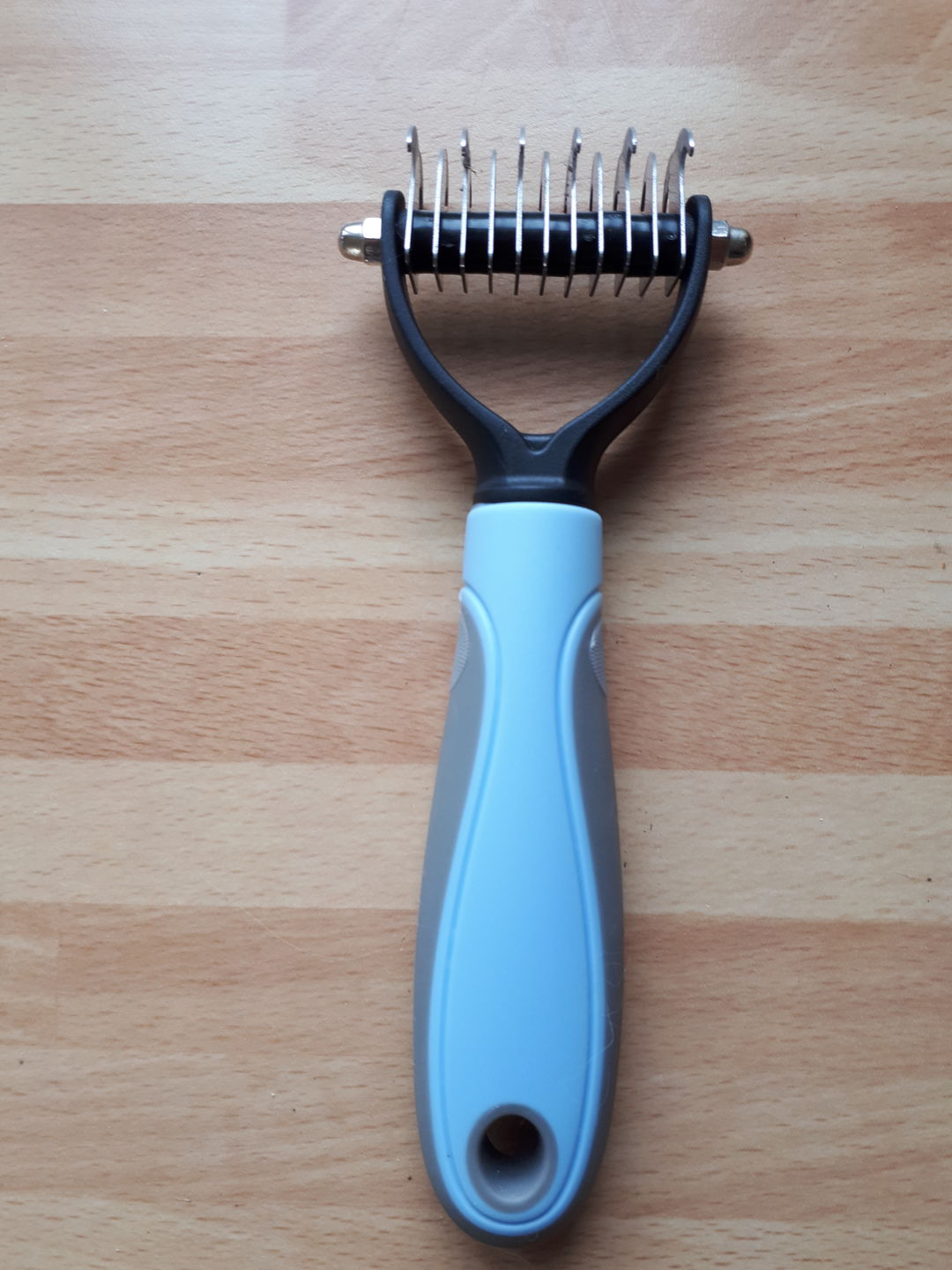 Customer photo review of Peigne de Toilettage Professionnel PuppySafe™