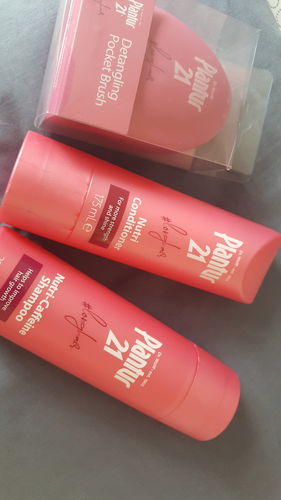Customer photo review of Plantur 21 #longhair Nutri-Caffeine Shampoo and Conditioner Set [Free Detangler Brush worth $14.9)