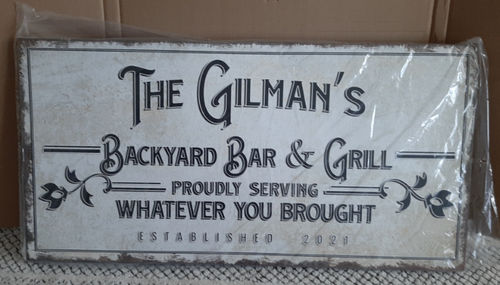 Customer photo review of Backyard Bar & Grill Sign