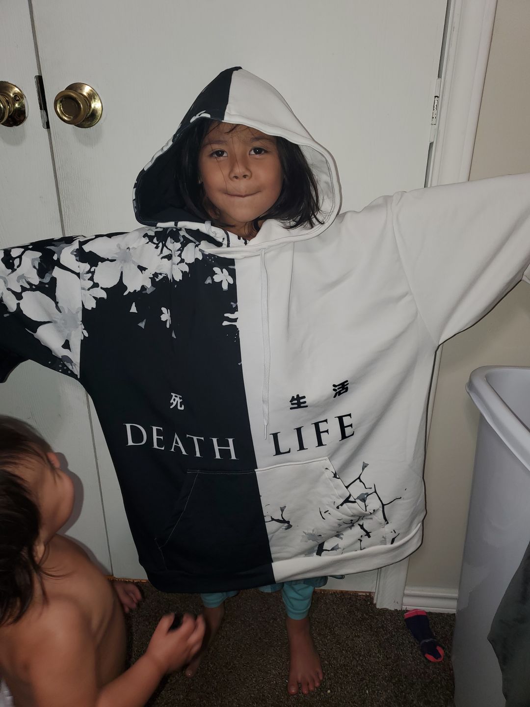 Customer photo review of Death & Life Hoodie