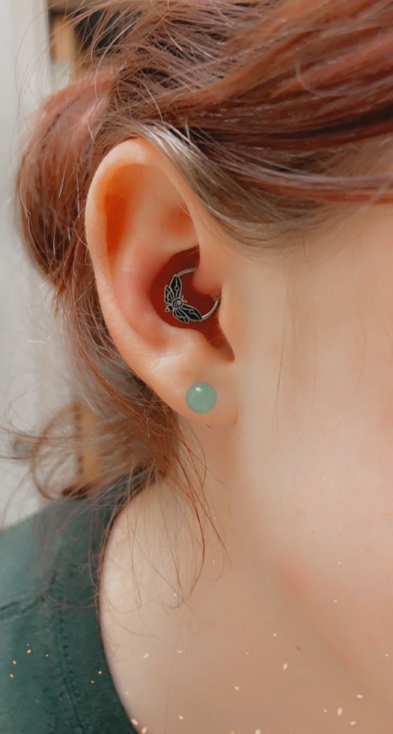 Customer photo review of 16G Death's Head Moth Captive Bead Ring