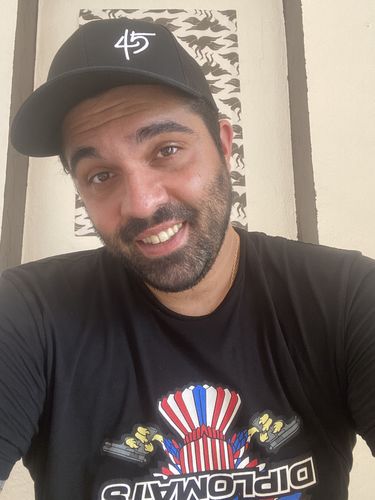 Customer photo review of "45" Signature Trucker Hat