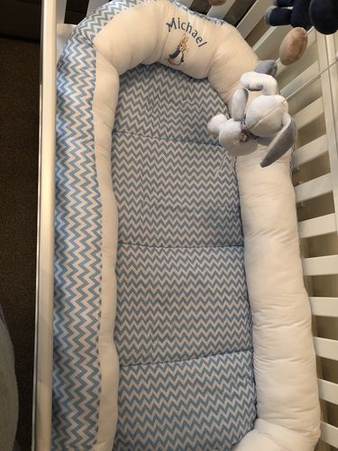 Customer photo review of Personalised Blue Zigzag And White Peter Rabbit Baby Sleep Nest Pod
