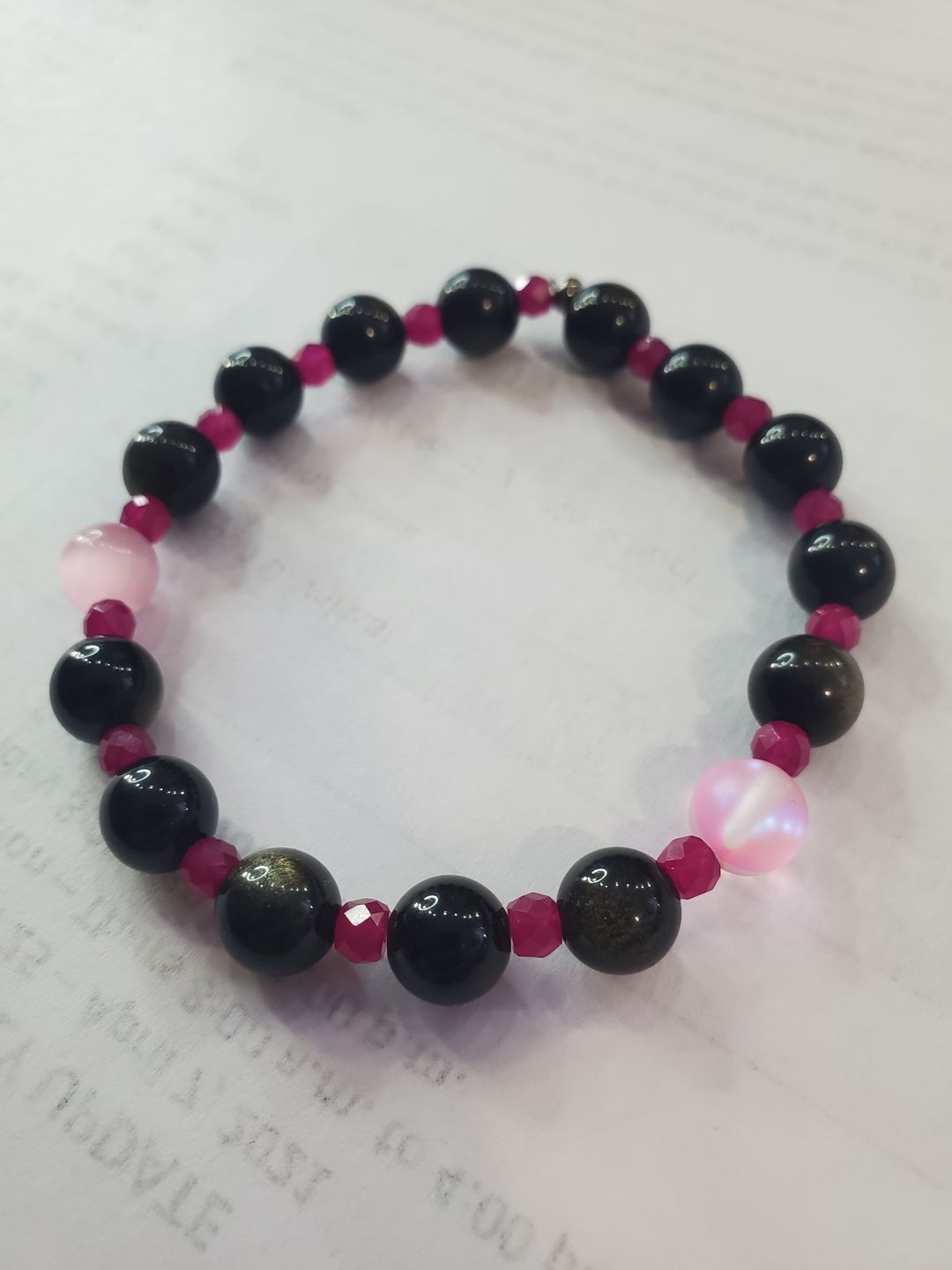Customer photo review of 15.5" Natural rainbow obsidian 6mm/8mm/10mm, Black obsidian round beads