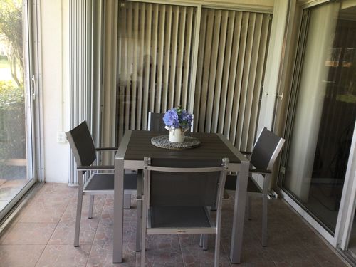 Customer photo review of Belvadare 5 Piece Brushed Aluminum Outdoor Dining Table Set