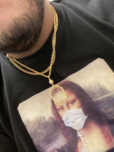 Customer photo review of Gold Carved Crystal Buddha Pendant
