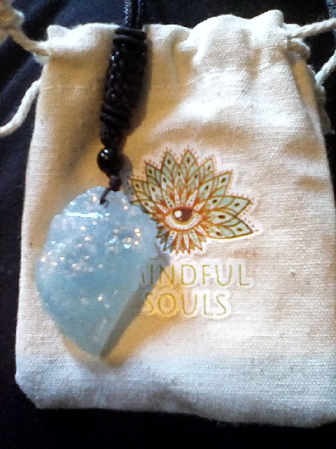 Customer photo review of Breathing Aquamarine Pendant